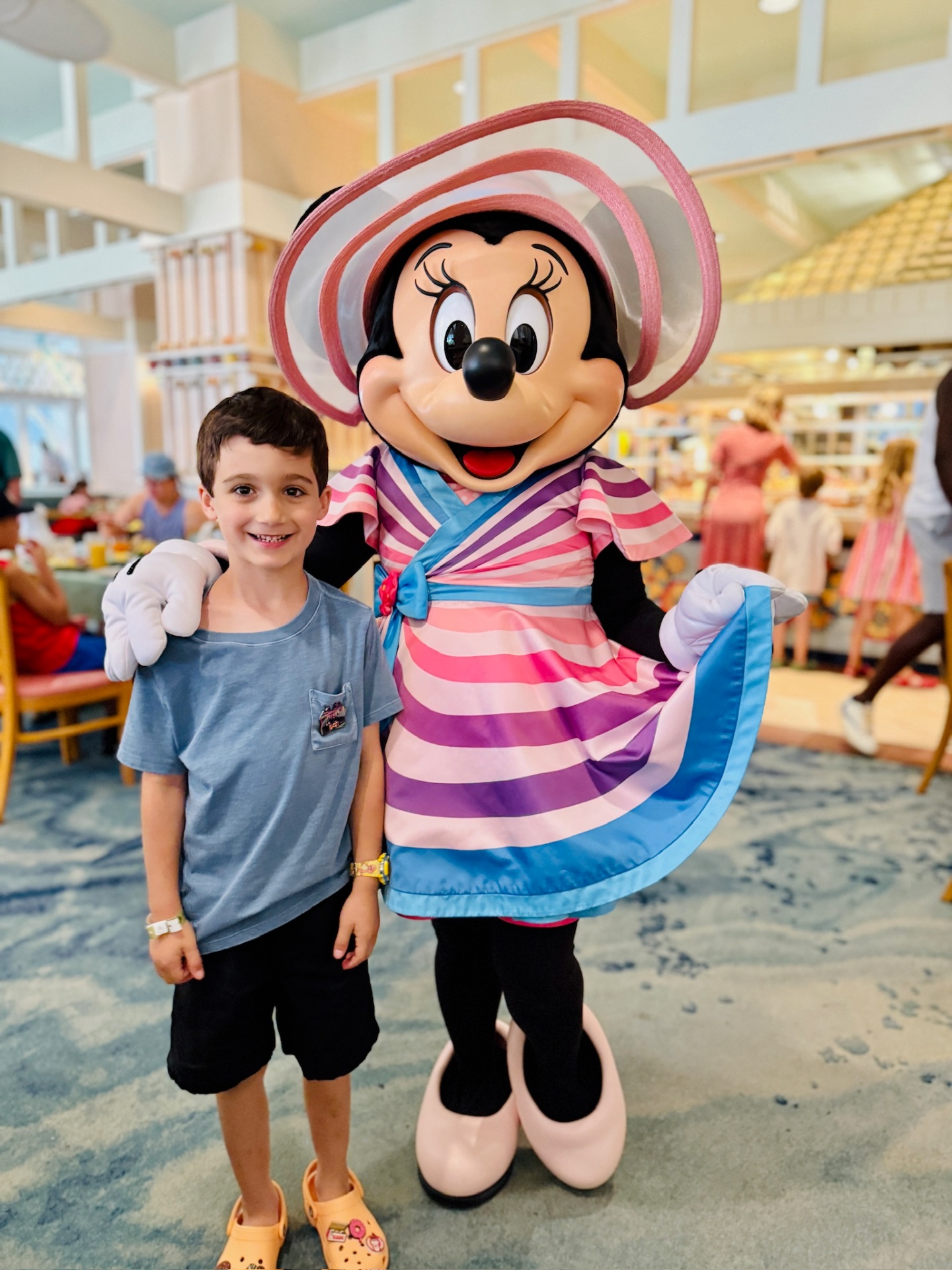 Young client posing with Minnie Mouse