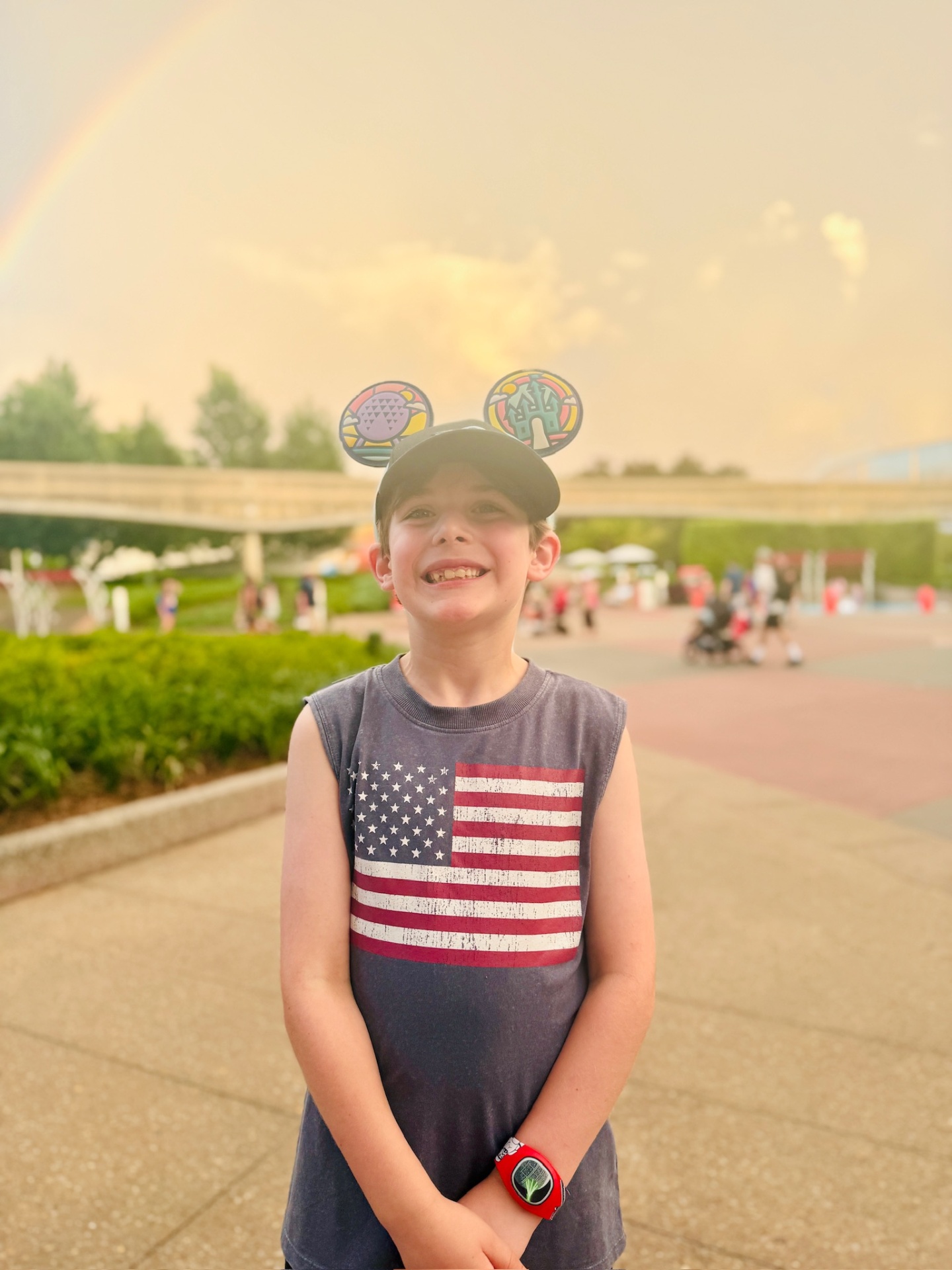 Young client in American flag shirt with Mickey ears